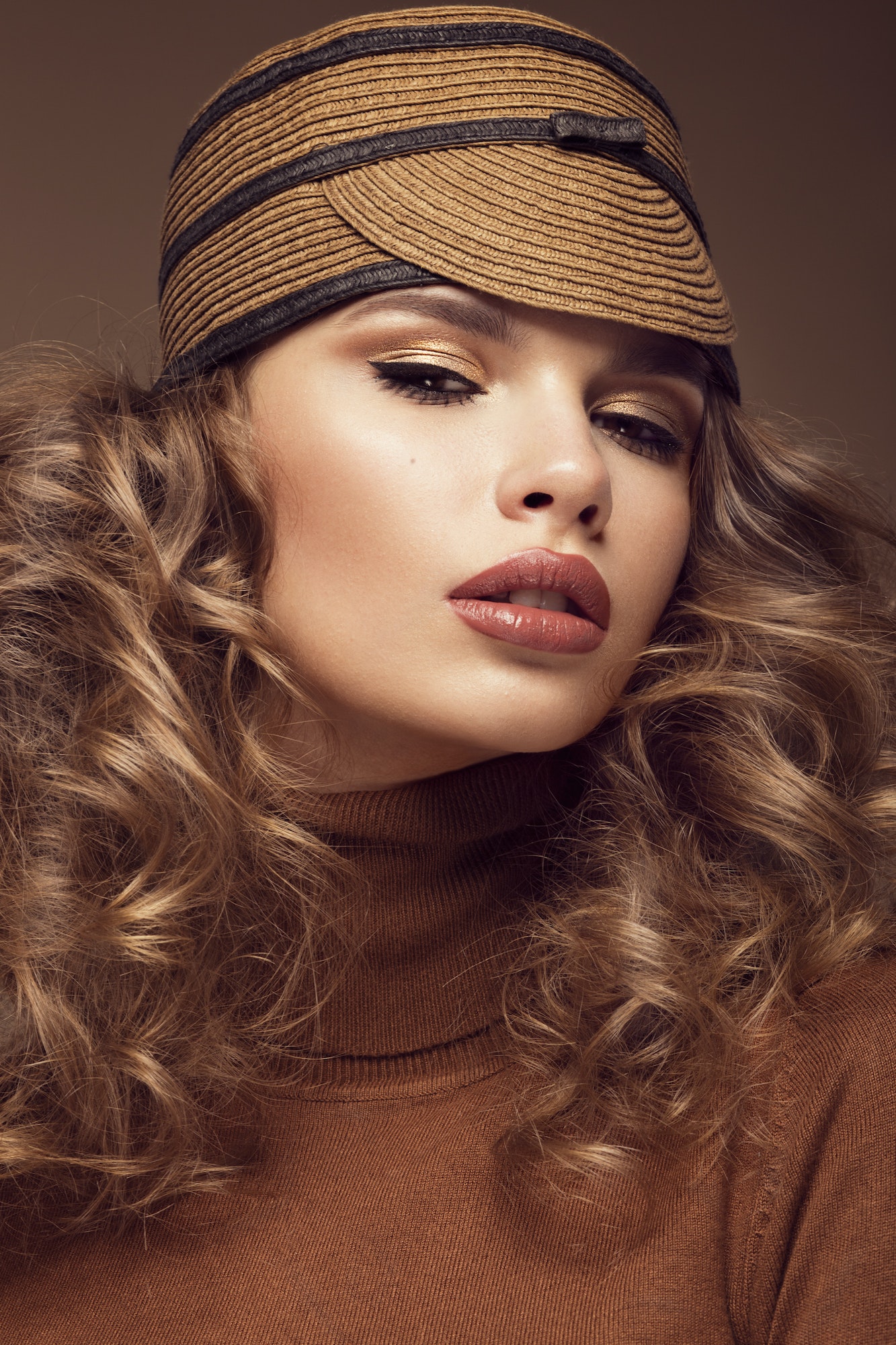 Pretty fresh girl in fashionable white hat, with unusual eyelashes and accessories.